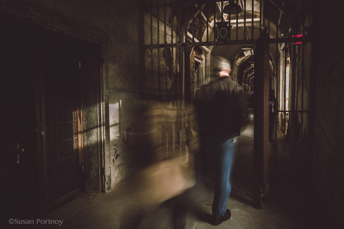 People walking in Eastern State Penitentiary
